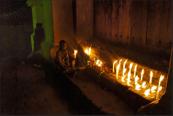 Chichicastenango. Church of Santo Tomas, lit by candles as a ritual offering, the night before the day of the market