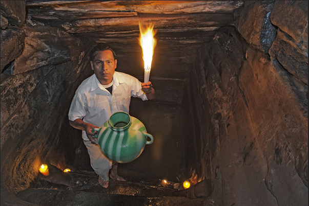 San Mateo Ixtatan-Felipe the official in charge of the town hall to collect salt water from one of the wells local San Mateo Ixtatan-Felipe the official in charge of the town hall to collect salt water from one of the wells local