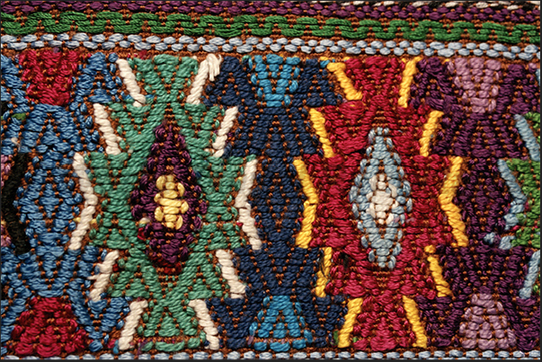 A Maya carpet with drawings and motifs depicting mythological animals, geometric shapes, but also plants and stylized flowers A Maya carpet with drawings and motifs depicting mythological animals, geometric shapes, but also plants and stylized flowers