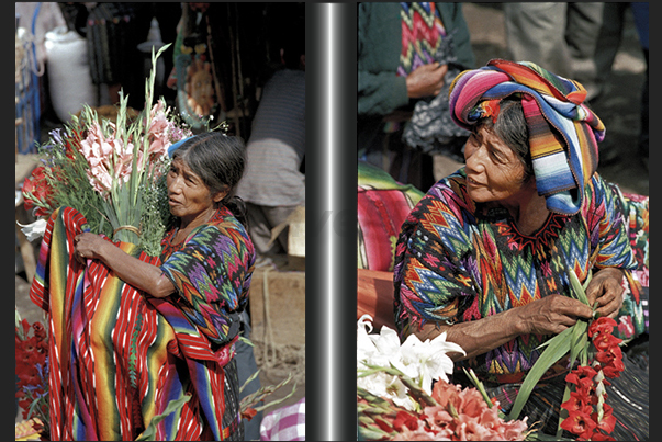 Maya women weave flowers during the Sunday market