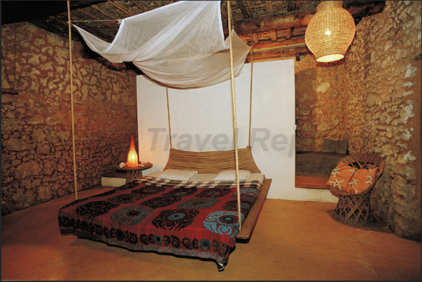A bed in Maldivian style, hanging from the ceiling, in a Posada in town A bed in Maldivian style, hanging from the ceiling, in a Posada in town