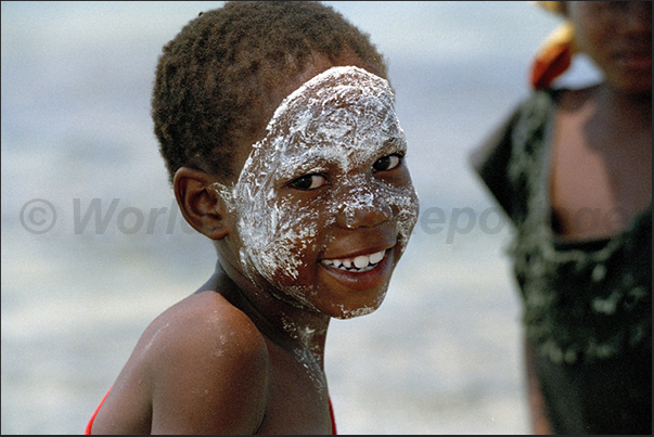 Portrait of women with the Musiro mask, obtained from the plant of the same name and used to protect yourself from the sun