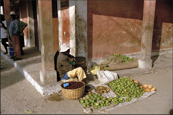 The market of fruit and vegetables
In the street, young women sell fruit, pastries and bread The market of fruit and vegetables
In the street, young women sell fruit, pastries and bread