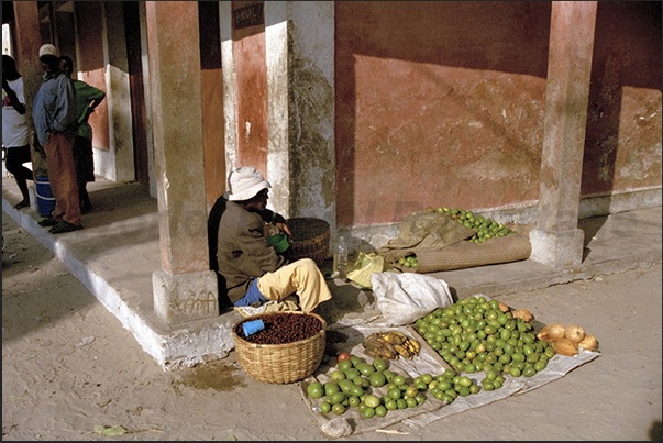 The market of fruit and vegetables
In the street, young women sell fruit, pastries and bread