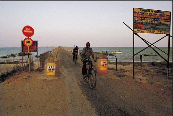 The bridge (3,5 km long), that connects the island to the mainland visible on the horizon