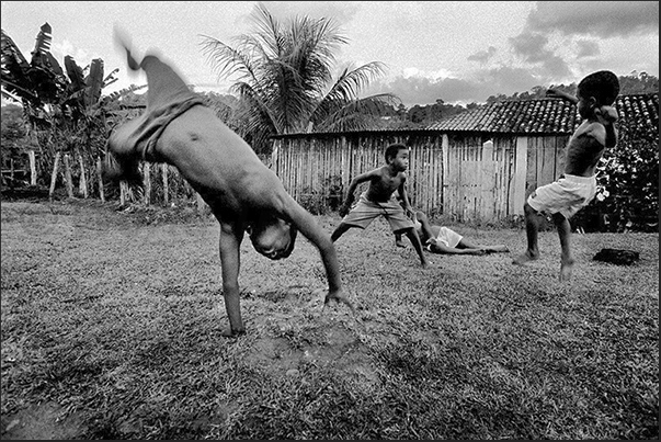 In the Fazendas during the moments of rest the kids have fun dancing the capoeira the ancient dance/fight of African slaves