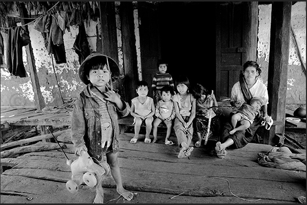Kontum Region. A family of ethnic Ba Na (Bahnar), vietnamese people living in the central highlands Kontum Region. A family of ethnic Ba Na (Bahnar), vietnamese people living in the central highlands