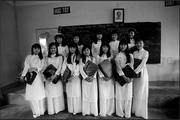 Na Trang town. Young high school students with the traditional dress Ao Dai Na Trang town. Young high school students with the traditional dress Ao Dai