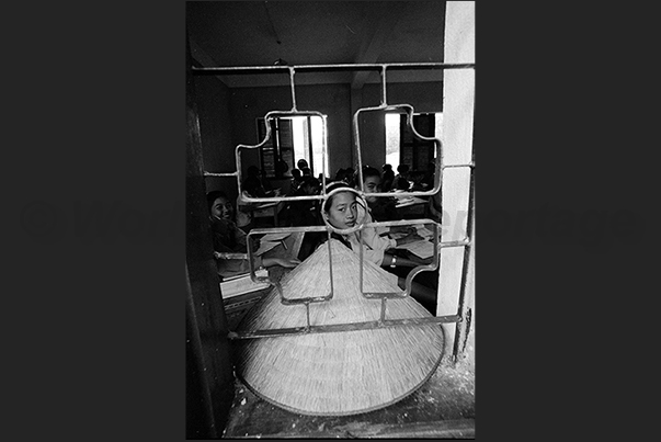 Near Huč. From the window of a school a student observes the photographer Near Huč. From the window of a school a student observes the photographer