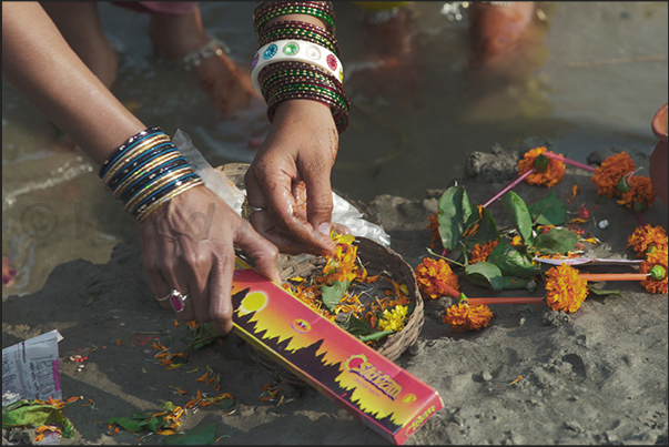 Preparing a Puja (a term that indicates an act of worship to a deity), which can be expressed in an offer, a cult, a ceremony or a ritual