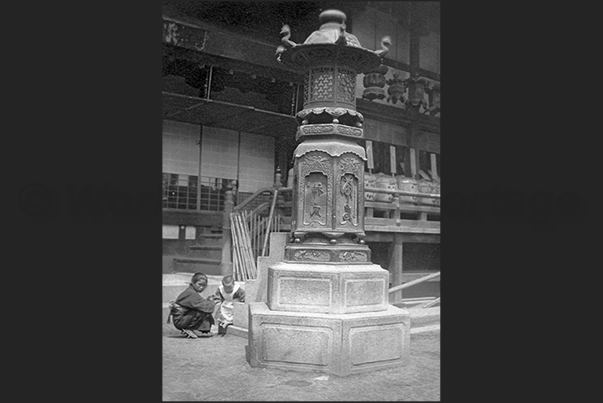 Japan. Osaka town. A stone lamp in a Shinto sanctuary