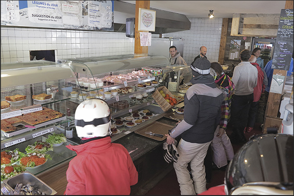 Stop for lunch at the Pointe du Razis refuge, one of the many eating places on the slopes of the ski area
