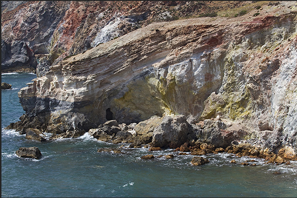 The cliffs rich of minerals and sulfur on the south coast of the island