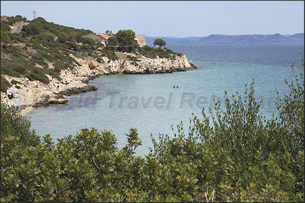 The east coast of Saint Antioco Island near the village of Portixeddu. On the horizon the eastern coasts of Sardinia