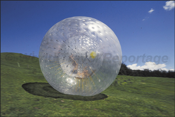Zorbing. Descent of the hill. Inside the sphere, to increase the fun, there is water