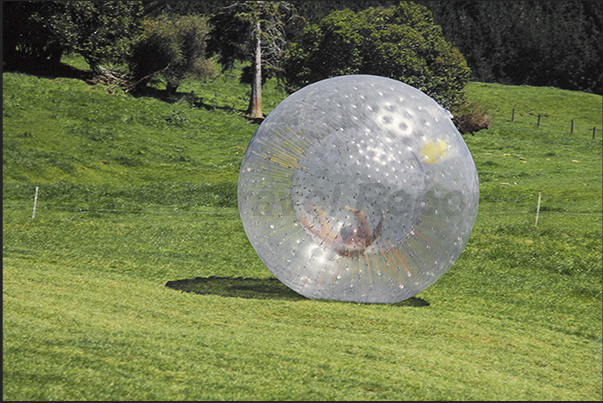 Zorbing. Descent of the hill. Inside the sphere, to increase the fun, there is water