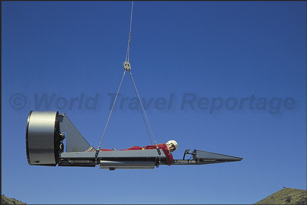 The vehicle used for Fly by wire. A flight by piloting a vehicle hanging on a steel cable