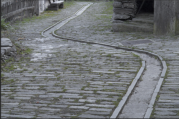 Stone-paved streets characterize the ancient mountain village of Laux