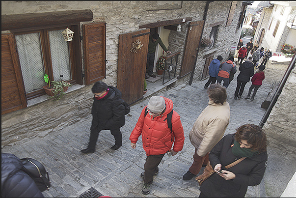 Usseaux village. People visiting the Christmas markets