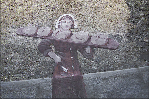 Usseaux. In the village murals and drawings tell stories and traditions of the alpine village