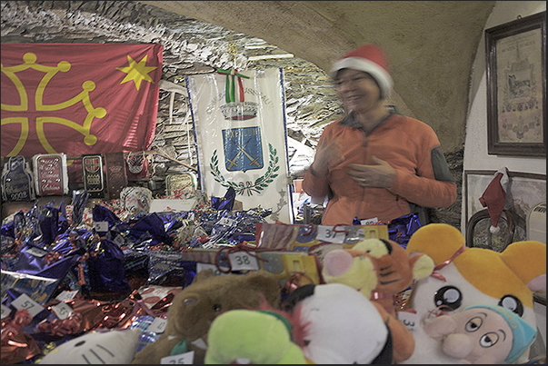 Usseaux. The Christmas markets are not held along the street but inside old stables following a path called Installarte