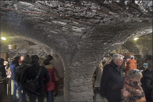 Usseaux. The Christmas markets are not held along the street but inside old stables following a path called Installarte