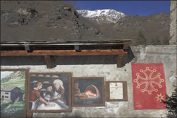 Usseaux. In the village murals and drawings tell stories and traditions of the alpine village