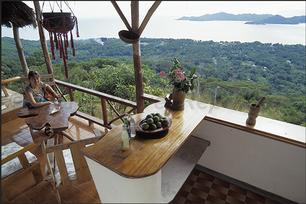 Restaurant panoramic view, the only one in the mountains far from the coast. On the horizon Praslin island