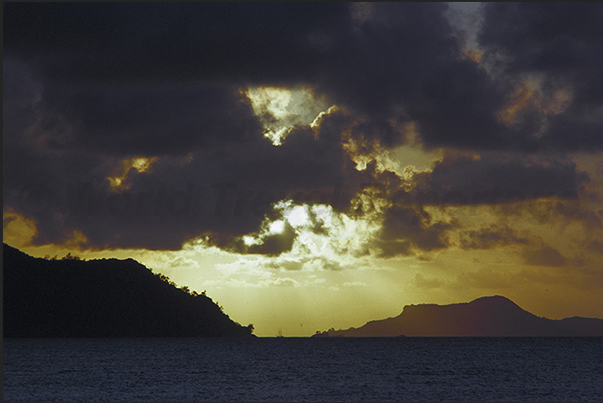 Sunset behind Praslin Island and Curieuse Island