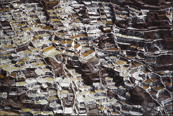 Salt pans of Maras, dating back to the Inca era, to extract the salt from the water descending from the Qaqawinay mountain