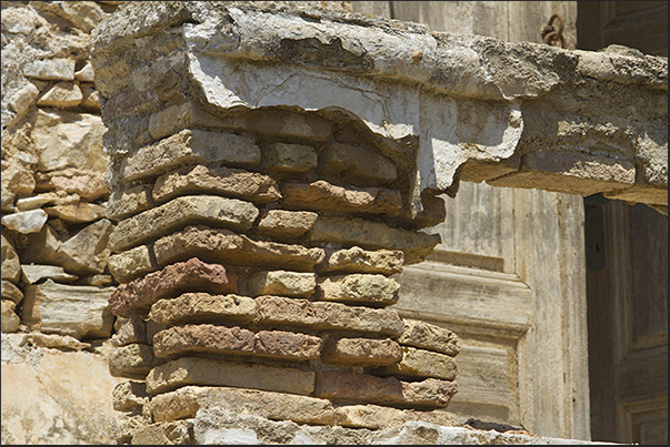 Megalo Livadi,. Mining company office structures eroded by wind and rain