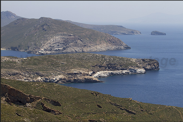 West Coast. On the horizon, the access to Koutala Bay West Coast. On the horizon, the access to Koutala Bay
