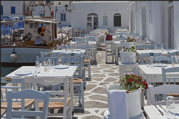 Naoussa. The waterfront of the old fishing port with restaurants on the docks