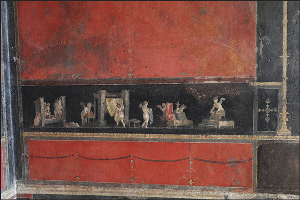 Fresco depicting some cupids (putti) playing various instruments