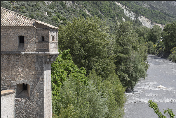 The walls with watchtowers on the Var River of the medieval village