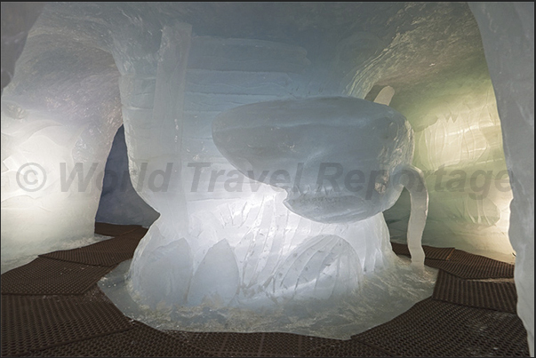 Inside the cave carved into the glacier, they were created several sculptures as, for example, a big shark