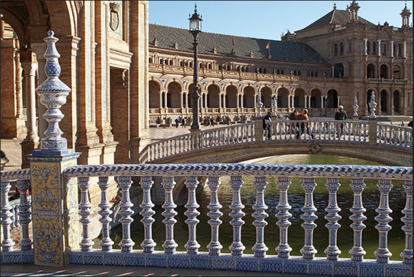 Sevilla, Plaza de Espańa (Spain Square). The bridges that reach the palaces built for the Ibero-American Exposition of 1929