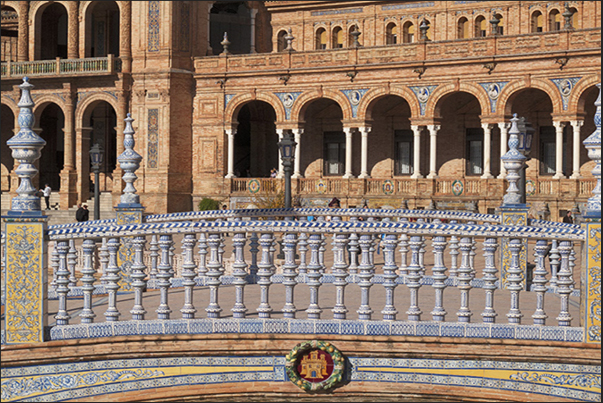 Sevilla, Plaza de Espańa (Spain Square). The bridges on the canals with ceramic columns Sevilla, Plaza de Espańa (Spain Square). The bridges on the canals with ceramic columns