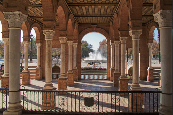 Sevilla, Plaza de Espańa (Spain Square). The arcades of the palaces overlooking the square Sevilla, Plaza de Espańa (Spain Square). The arcades of the palaces overlooking the square