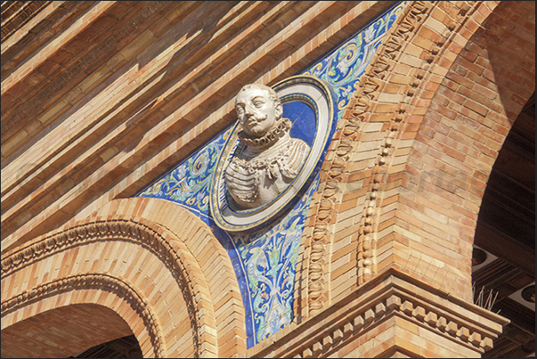 Sevilla, Plaza de Espańa (Spain Square). Decorations on the facades of buildings Sevilla, Plaza de Espańa (Spain Square). Decorations on the facades of buildings