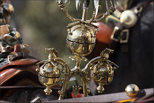 The bells, put on the horses, warn the crowd that the battle wagons are coming The bells, put on the horses, warn the crowd that the battle wagons are coming