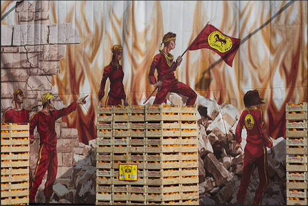 Every neighborhood prepares the ammunition (oranges), ready to throw the oranges against to the guards on the chariots Every neighborhood prepares the ammunition (oranges), ready to throw the oranges against to the guards on the chariots