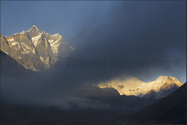 In the evening, low clouds envelop the mountains around Dingboche