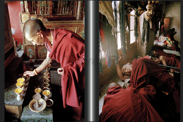 While a monk lights the candles to pray, in another room other monks resting after dancing While a monk lights the candles to pray, in another room other monks resting after dancing