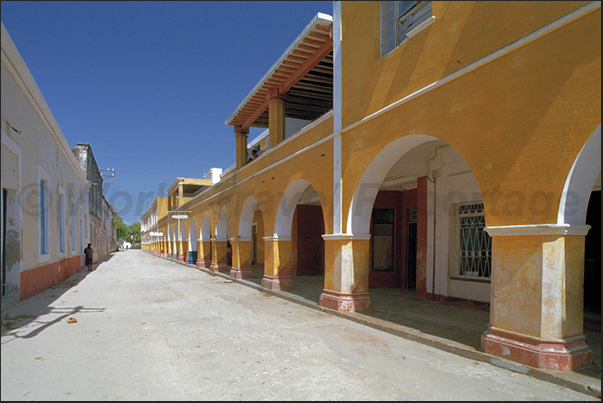 The arcades along the main road in the center of the ancient colonial town