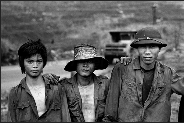 Group of miners in the mining village of Cam Pha, northern province of Quang Ninh (border with China)
