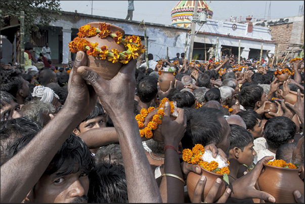 The offer for the Harihar Nath Tample, jugs with water from the holy river and flowers